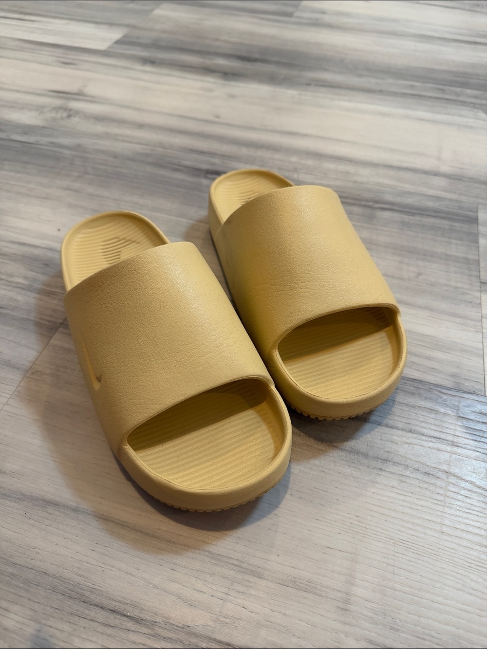 Nike Women's Pale Yellow Slide Sandals